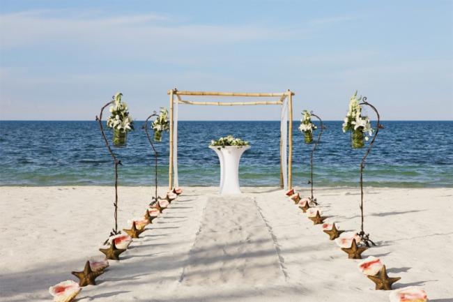 Walk down the beach to recite you nuptials at the Beloved Hotel in Cancun, Mexico