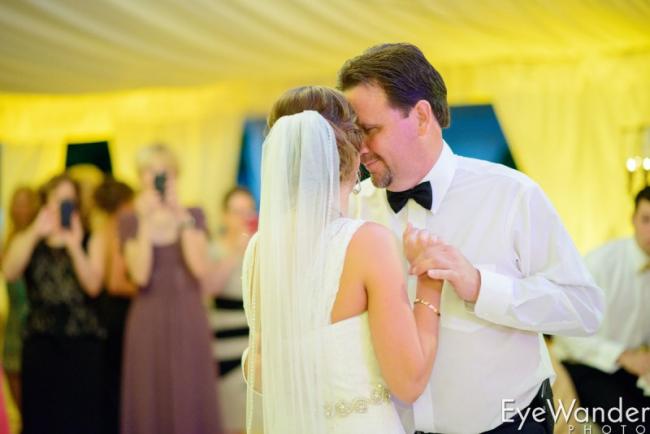 A Father Dancing With Her Daughter