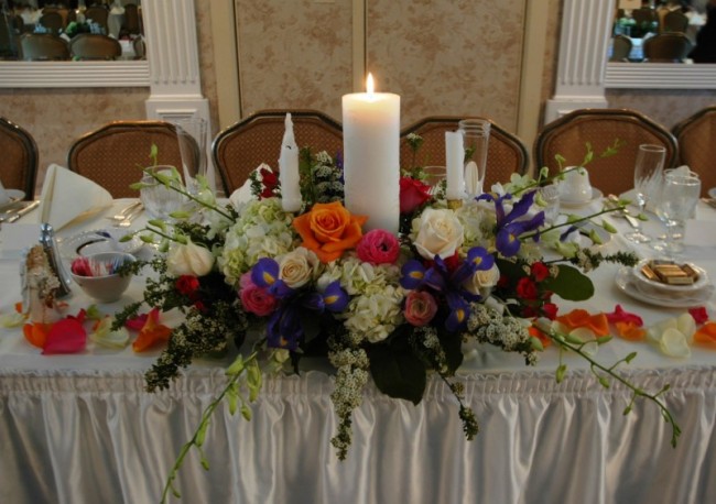 Unity Candle With Bright Flowers