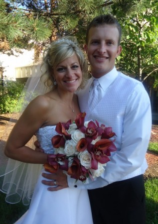 Beautiful Bride & Groom With Her Wedding Bouquet