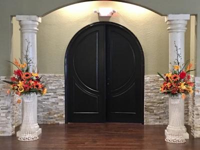 Large Flower Arrangements at Wedding Entrance